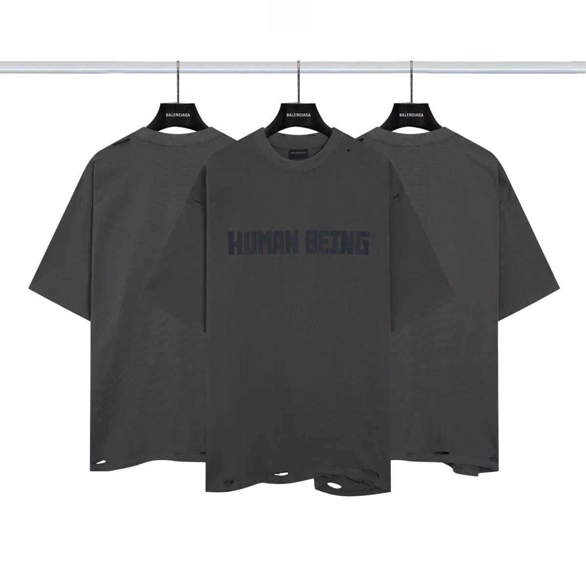 巴黎世家Balenciaga HUMAN BEING SHIFTED印花破洞短袖💰P90 颜色:大象灰