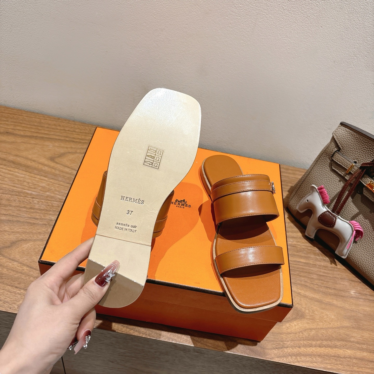 Hermes Oran Sandal: Leather Flat Slides with Signature H Cutout, Comfortable & Stylish 10 i1744461016483 1104 0 8