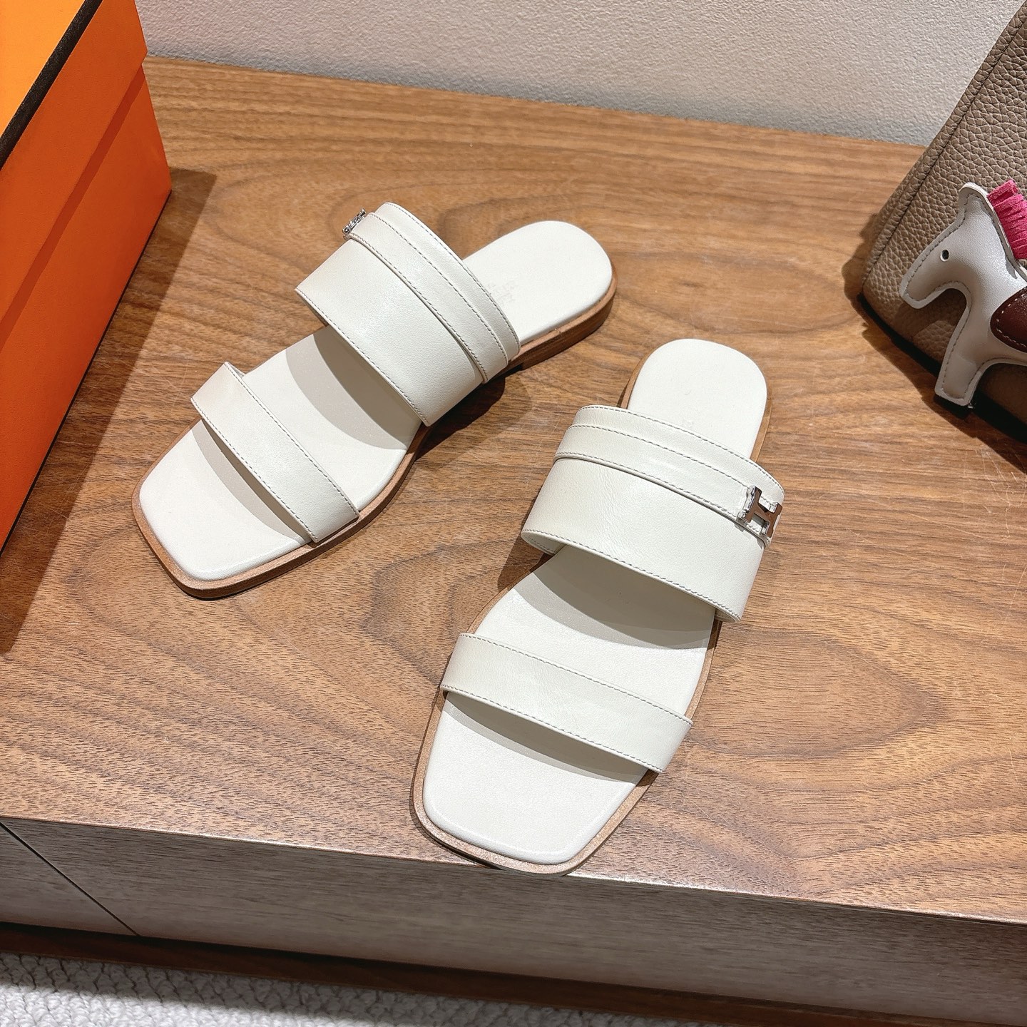 Hermes Oran Sandal: Flat Leather Slides with Iconic 'H' Cutout Design 4 i1744461046336 2859 0 1