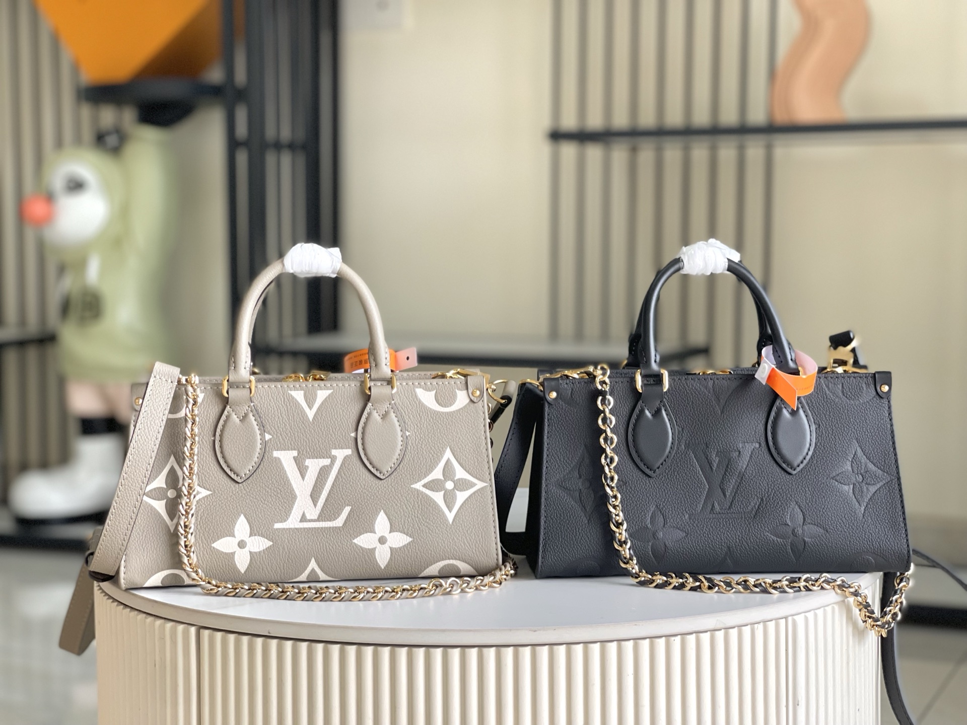 Louis Vuitton Monogram Empreinte Marais Mini Bag, Leather Top Handle Handbag