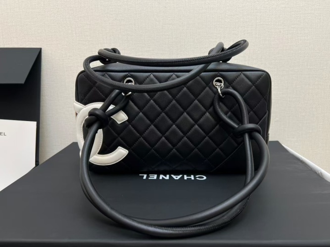 Chanel Black Leather Bowling Bag with Interlocking CC Logo, Quilted Design 1 Chanel Black Leather Bowling Bag with Interlocking CC Logo, Quilted Design