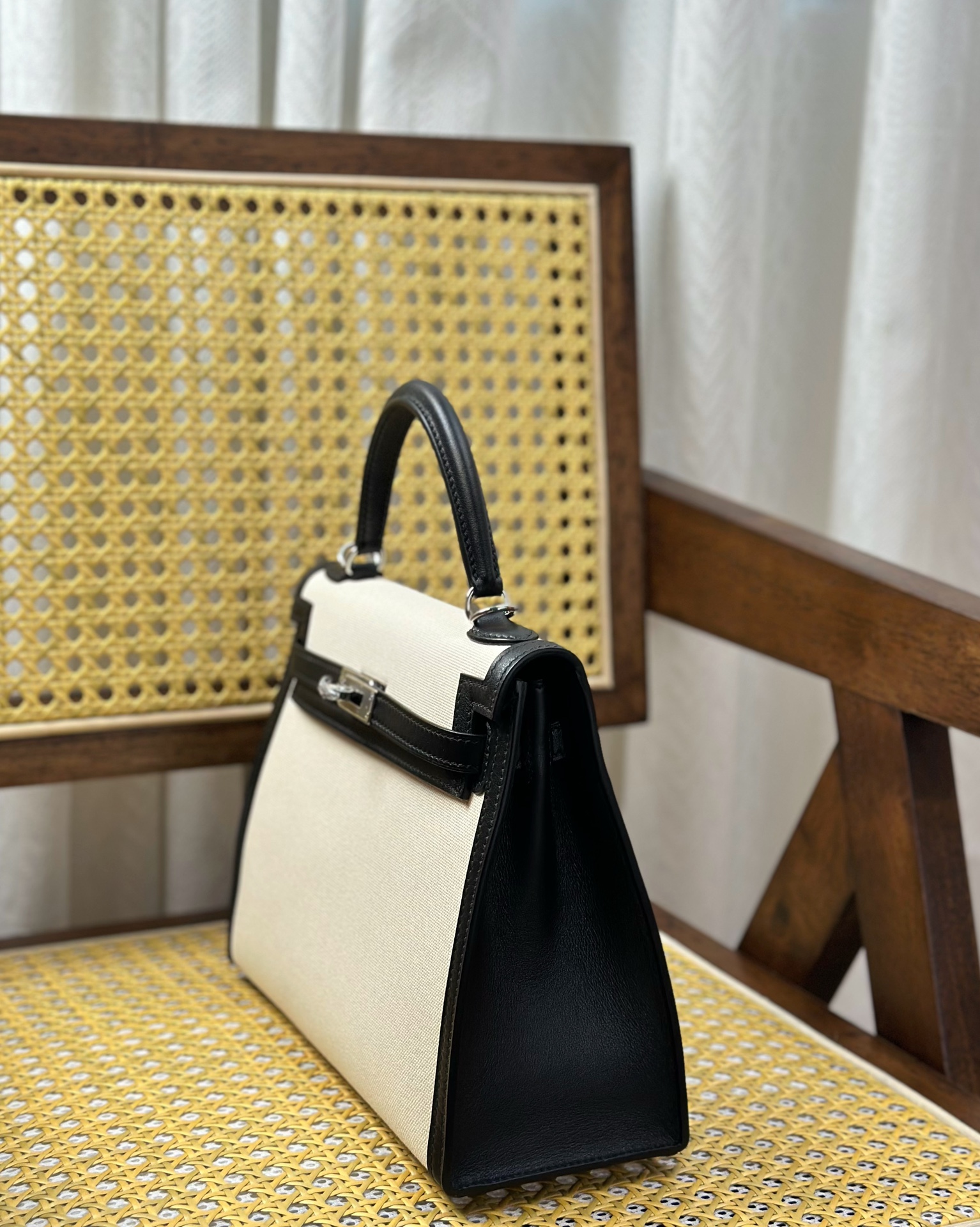 Hermès Kelly 25 cm black and white panda color silver buckle