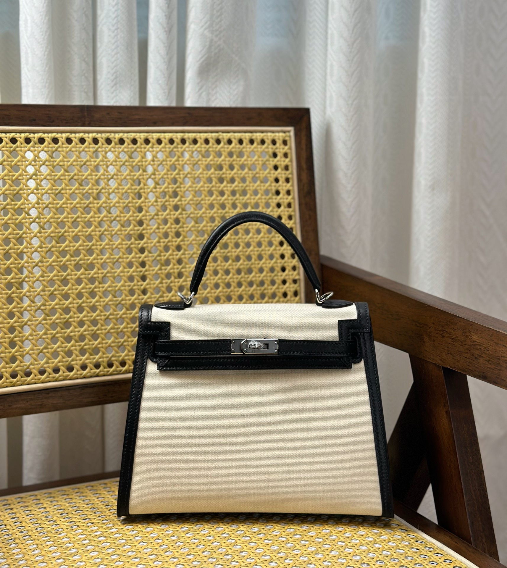 Hermès Kelly 25 cm black and white panda color silver buckle