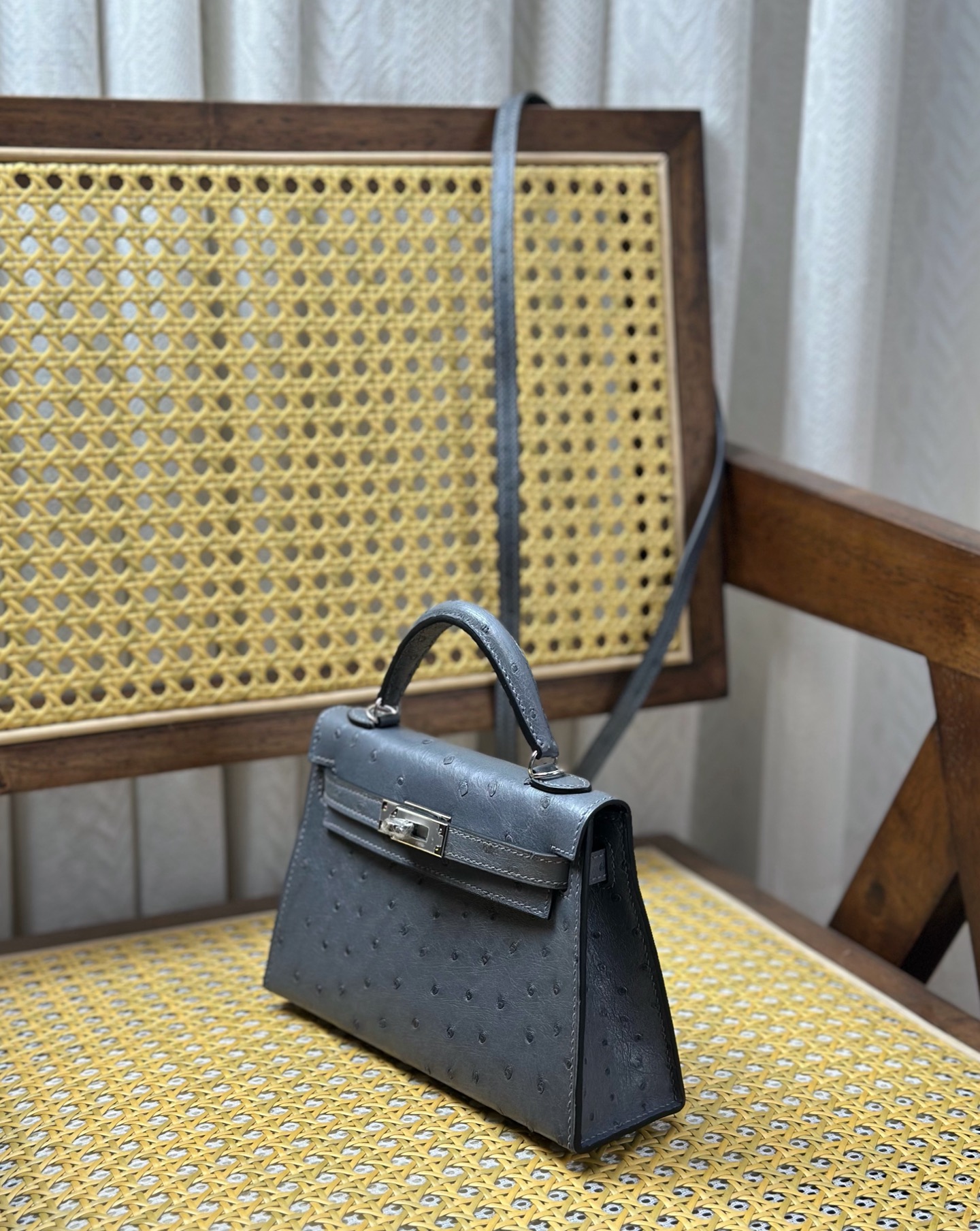 Hermès Kelly/mini second generation ostrich leather gray silver buckle