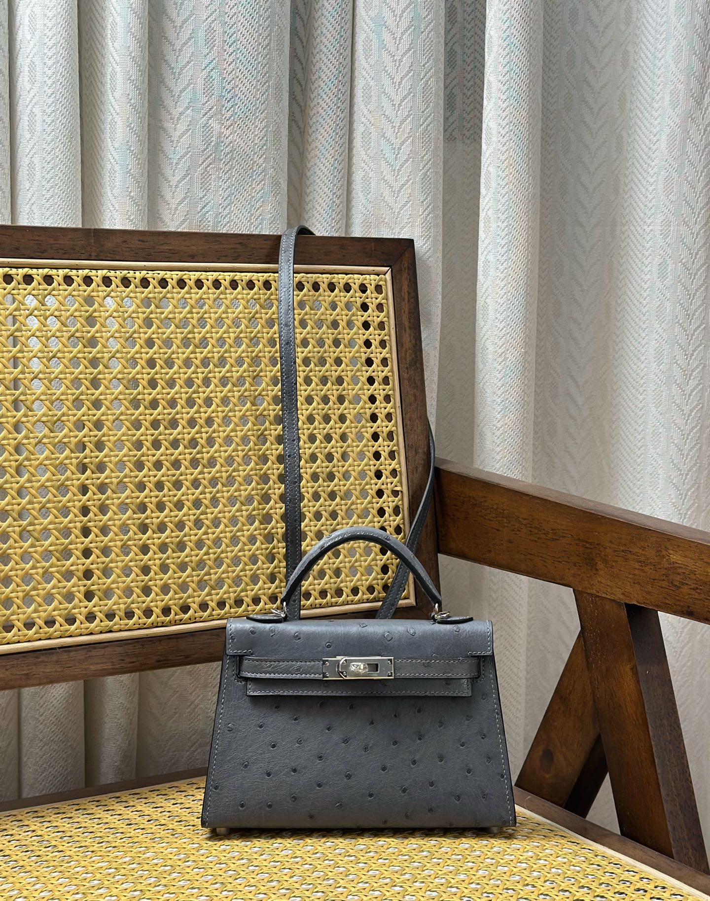 Hermès Kelly/mini second generation ostrich leather gray silver buckle