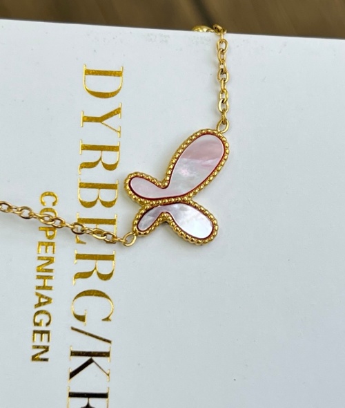 Dyrberg/Kern Butterfly Pendant Necklace with Mother of Pearl in Gold Tone 1 Dyrberg/Kern Butterfly Pendant Necklace with Mother of Pearl in Gold Tone
