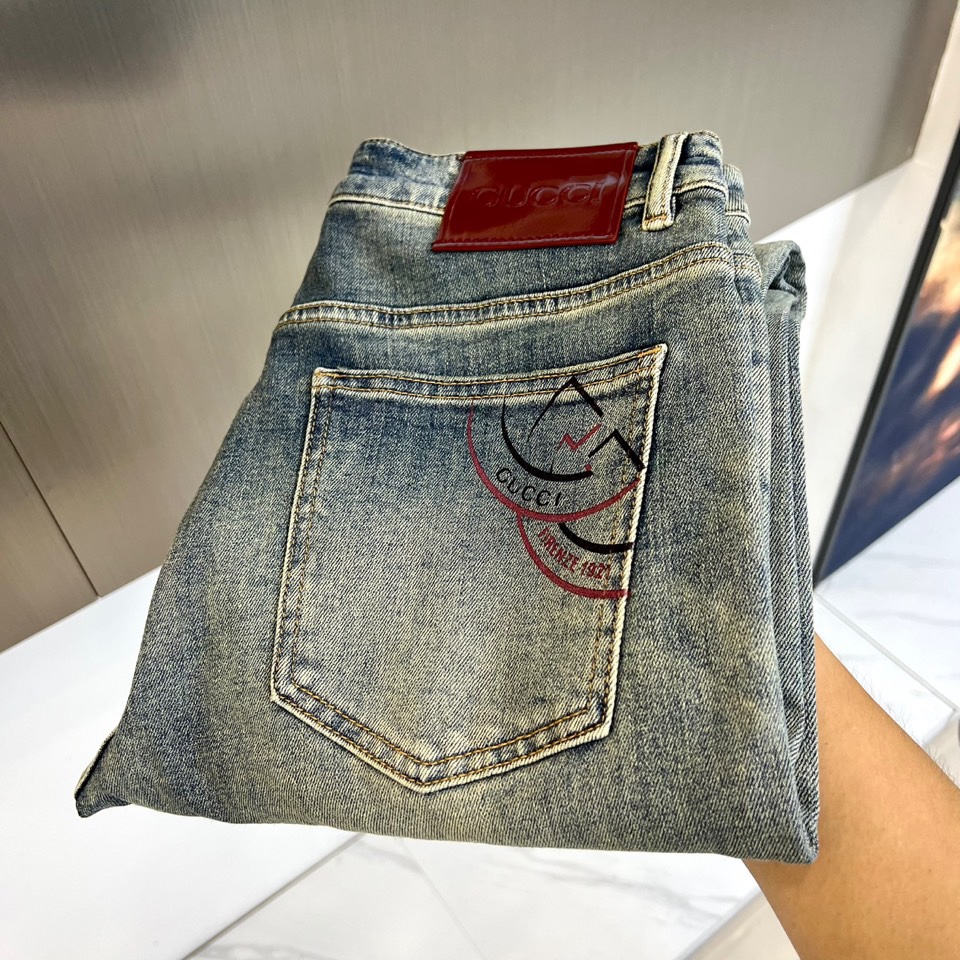 Gucci Men’s Classic Blue Cotton Jeans with Unique Water Wash Design