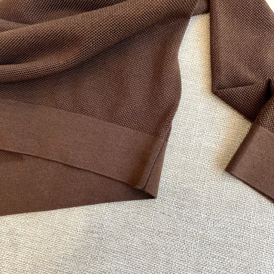 Zegna杰尼亚、2025秋冬新款简约商务休闲无扣翻领长袖男士针织POLO衫。海鸥领的设计理念打破传统固