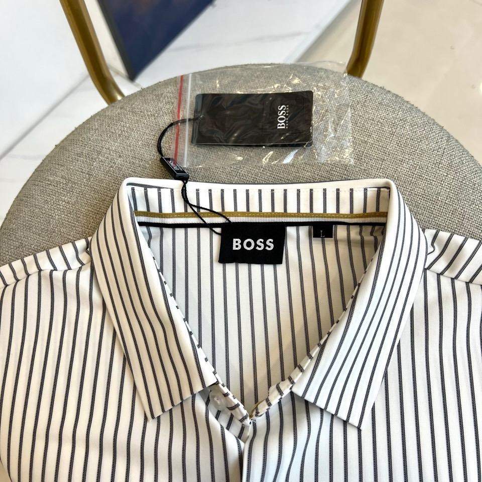 BOSS 、2025秋冬新品男士经典条纹衬衫。以匠心细节诠释现代商务美学，重塑职场精英的日常着装典范1.