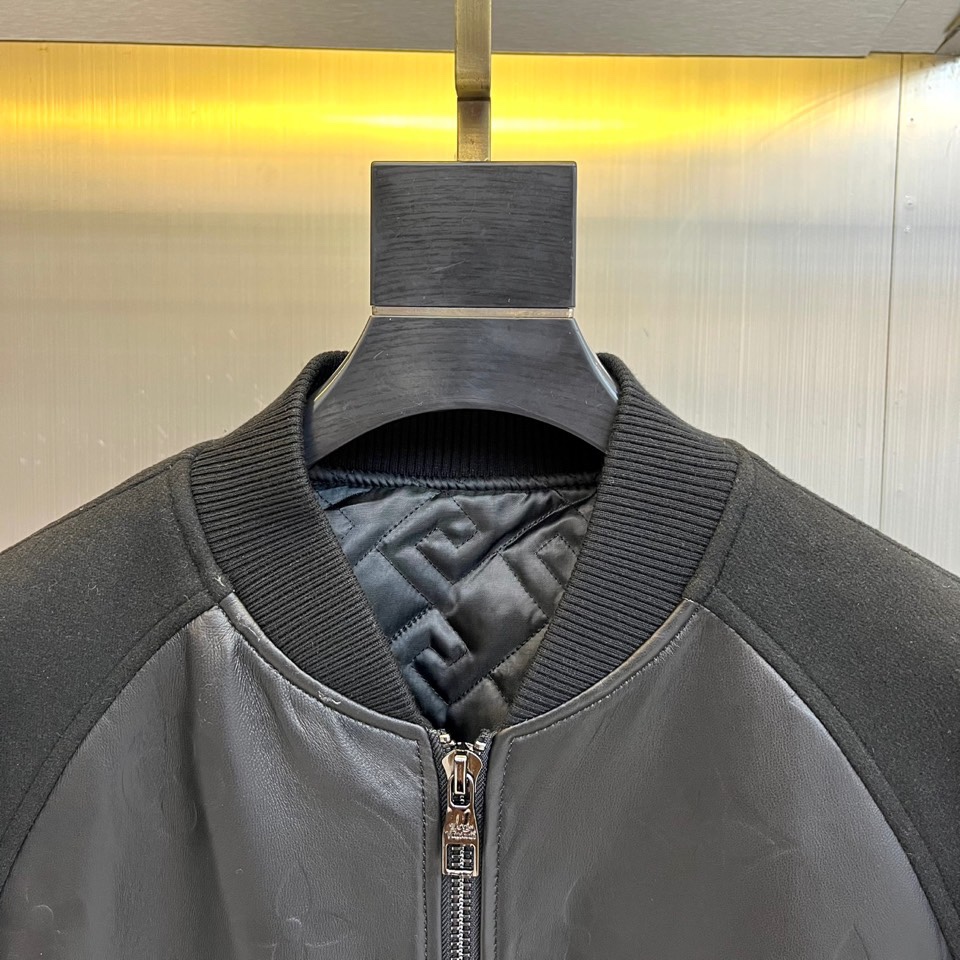 1v威登、2025秋冬拼接皮衣夹克。本款黑色夹克核心亮点在于光滑皮革与弹性罗纹针织的立体拼接，肩部、领口