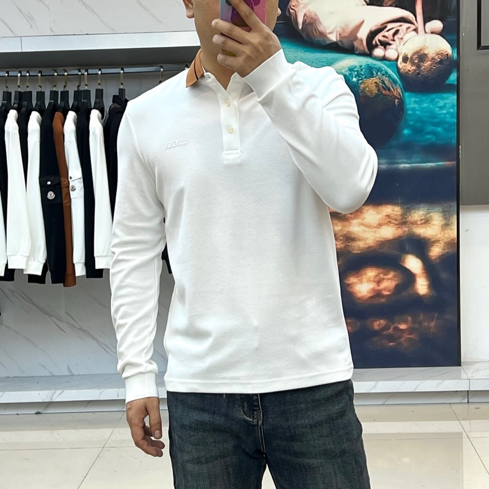 杰尼亚、2025秋冬新品男士长袖Polo衫，经典翻领设计巧妙融入棕色拼接细节，领缘点缀黑色细条纹提升精致