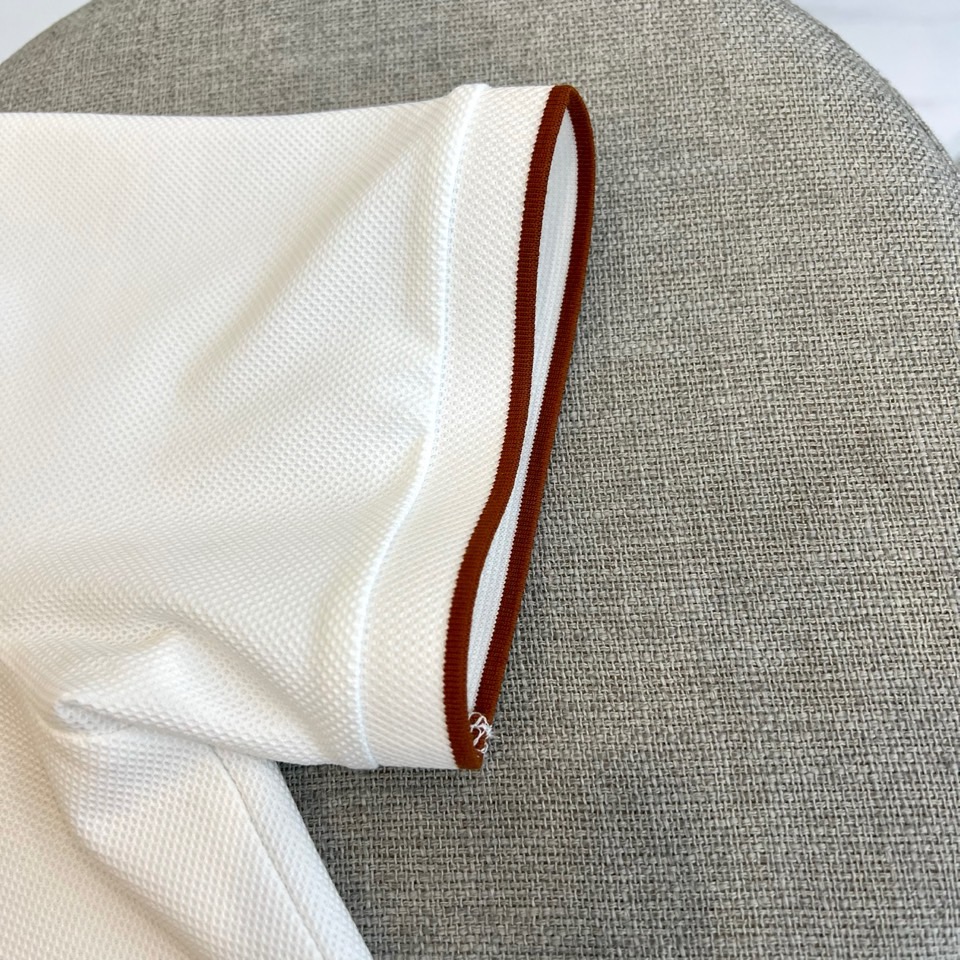 Zegna杰尼亚、2026春夏新品男士短袖Polo衫，以极简优雅重塑经典。纯色搭配撞色滚边，从翻领延伸至
