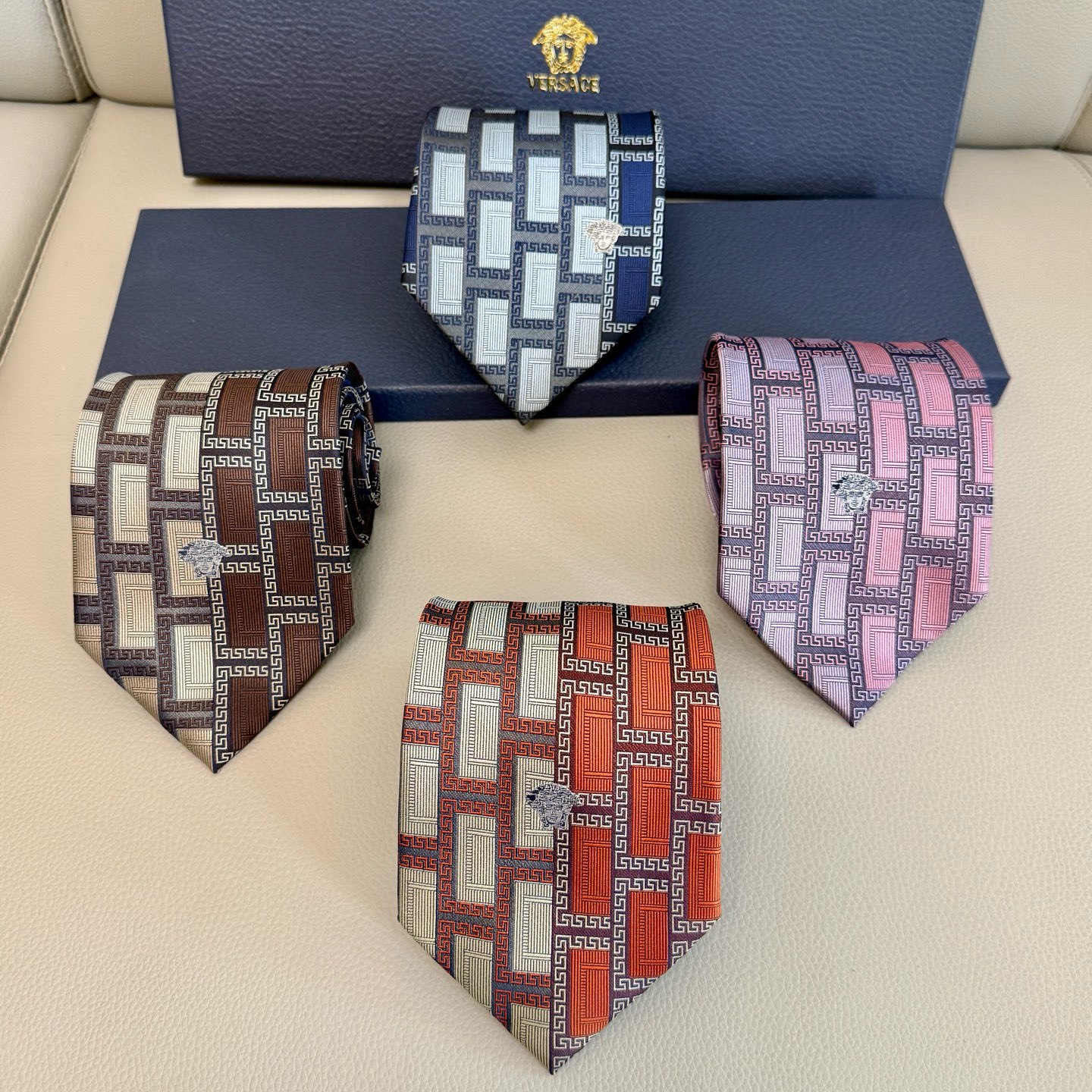 NO:301924,Exquisite Medusa Versace classic logo tie!  The mythical Medusa is beautiful and irresistible. The color scheme also clearly reflects the pioneering art of the brand's style and luxury trend. The silk material is delicate in the hand and has a gorgeous luster. The top body is very finishing touch. Versace is a luxury brand from Italy. The brand was founded in Milan in 1978 by Italian designer Gianni Versace, his brother Santo and his sister Donatella!   The 