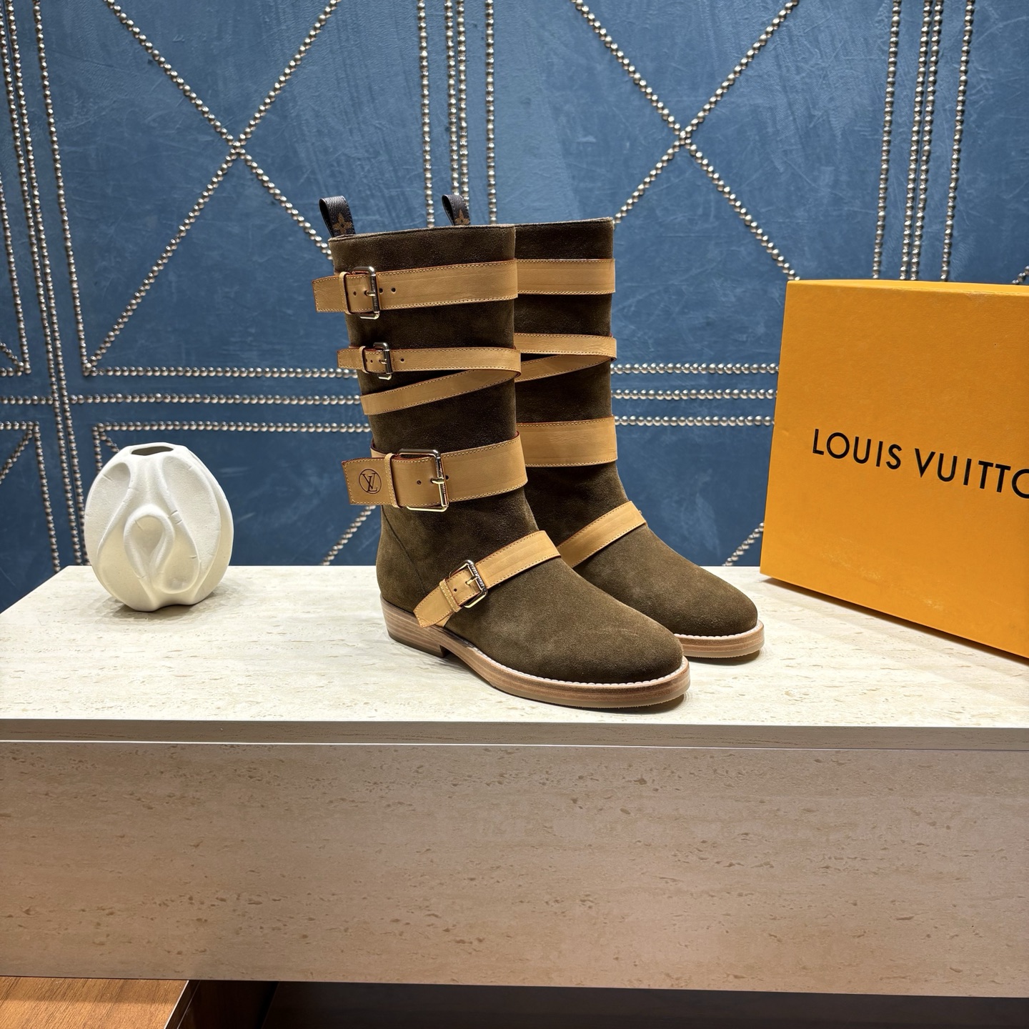 louis vuitton brown strapped shearling boots