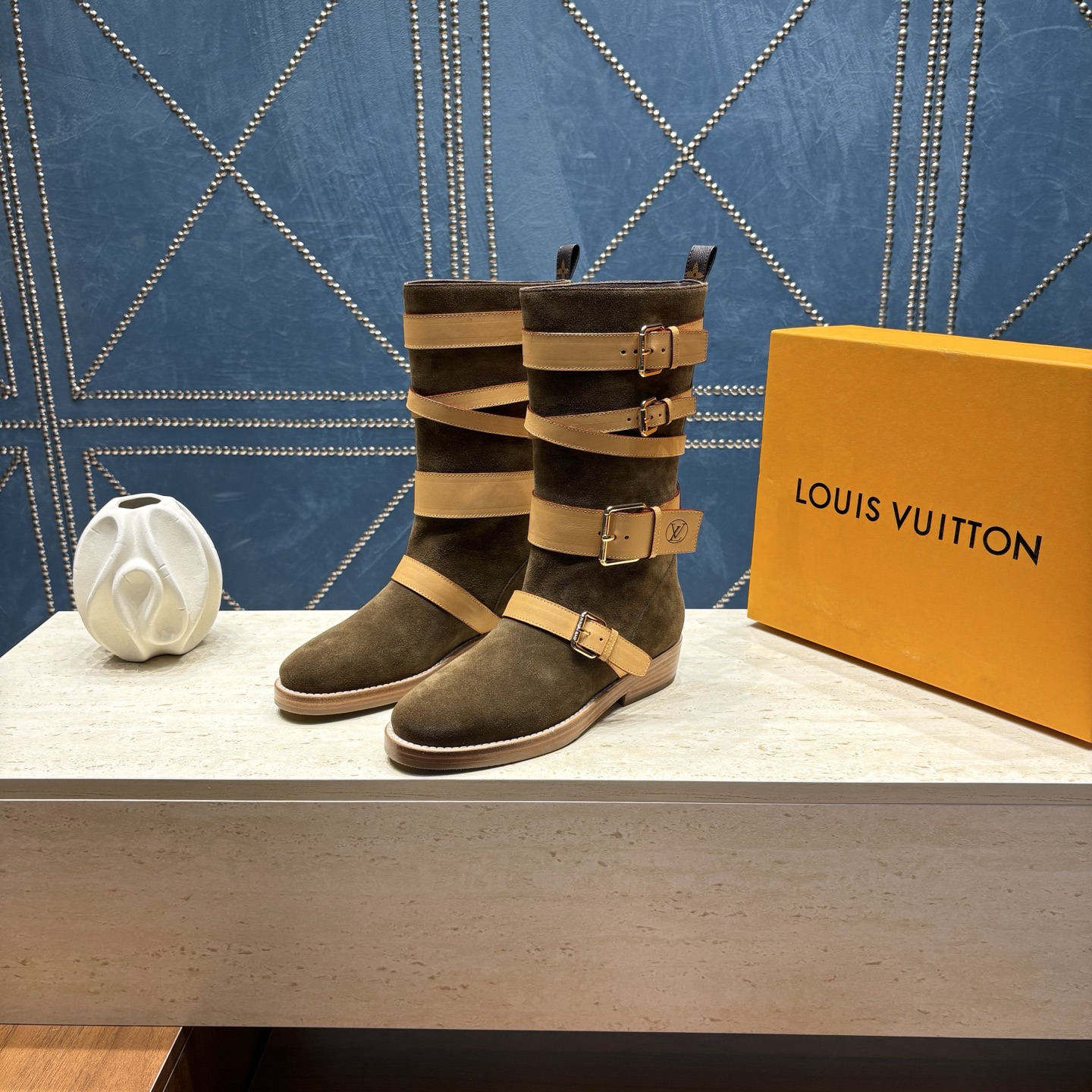 louis vuitton brown strapped shearling boots