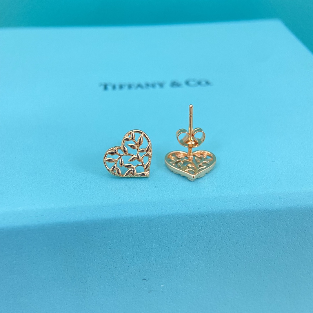 ¥98 蒂芙尼耳钉 新品树叶纹镂空爱心耳钉 