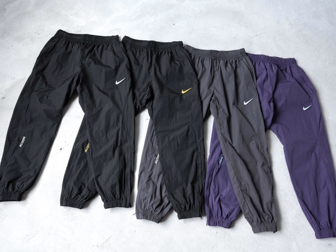 Nike x Drake NOCTA Track Pants - Loose Fit, Zipper Pockets, Limited Edition 1 Nike x Drake NOCTA Track Pants - Loose Fit, Zipper Pockets, Limited Edition