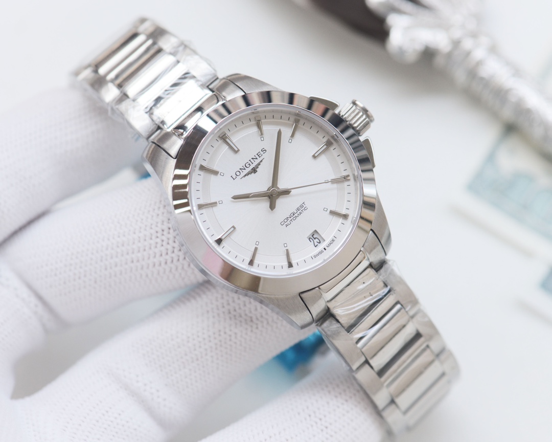 Longines Conquest stainless steel case and bracelet, blue dial 34mm Women's Quartz