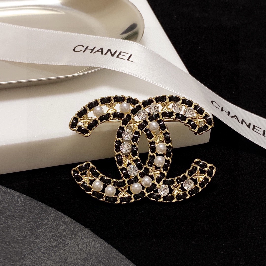 Comercio
 Chanel Joyas Broche Mujeres