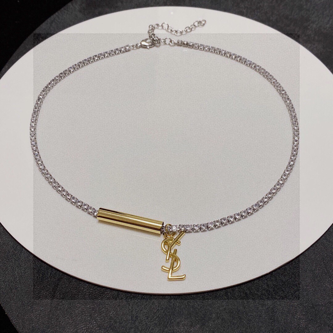 Saint Laurent Cassandre YSL Monogram Crystal Tennis Choker necklace Silver-toned metal with clear faceted crystals gold-toned metal logo and bar charm 40cm with 5cm extender chain