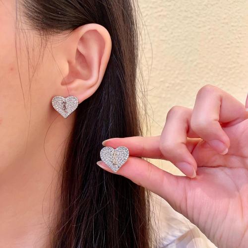 Yves Saint Laurent Heart Stud Earrings in Silver with Crystal Accents 1 Yves Saint Laurent Heart Stud Earrings in Silver with Crystal Accents