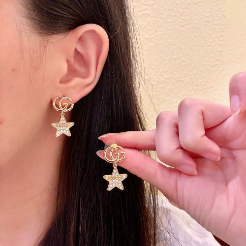 Gucci Gold-Tone Star Drop Earrings With Crystals, Interlocking GG Studs 1 Gucci Gold-Tone Star Drop Earrings With Crystals, Interlocking GG Studs