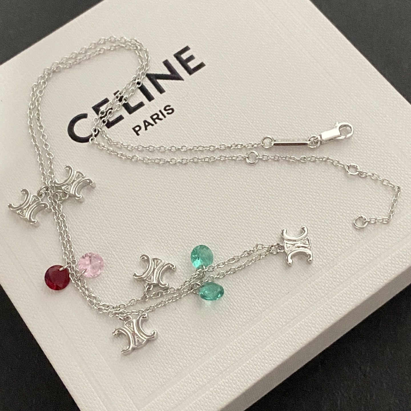 Celine Triomphe Multi Charm necklace Silver-toned metal with red pink and green faceted stone charms 45cm