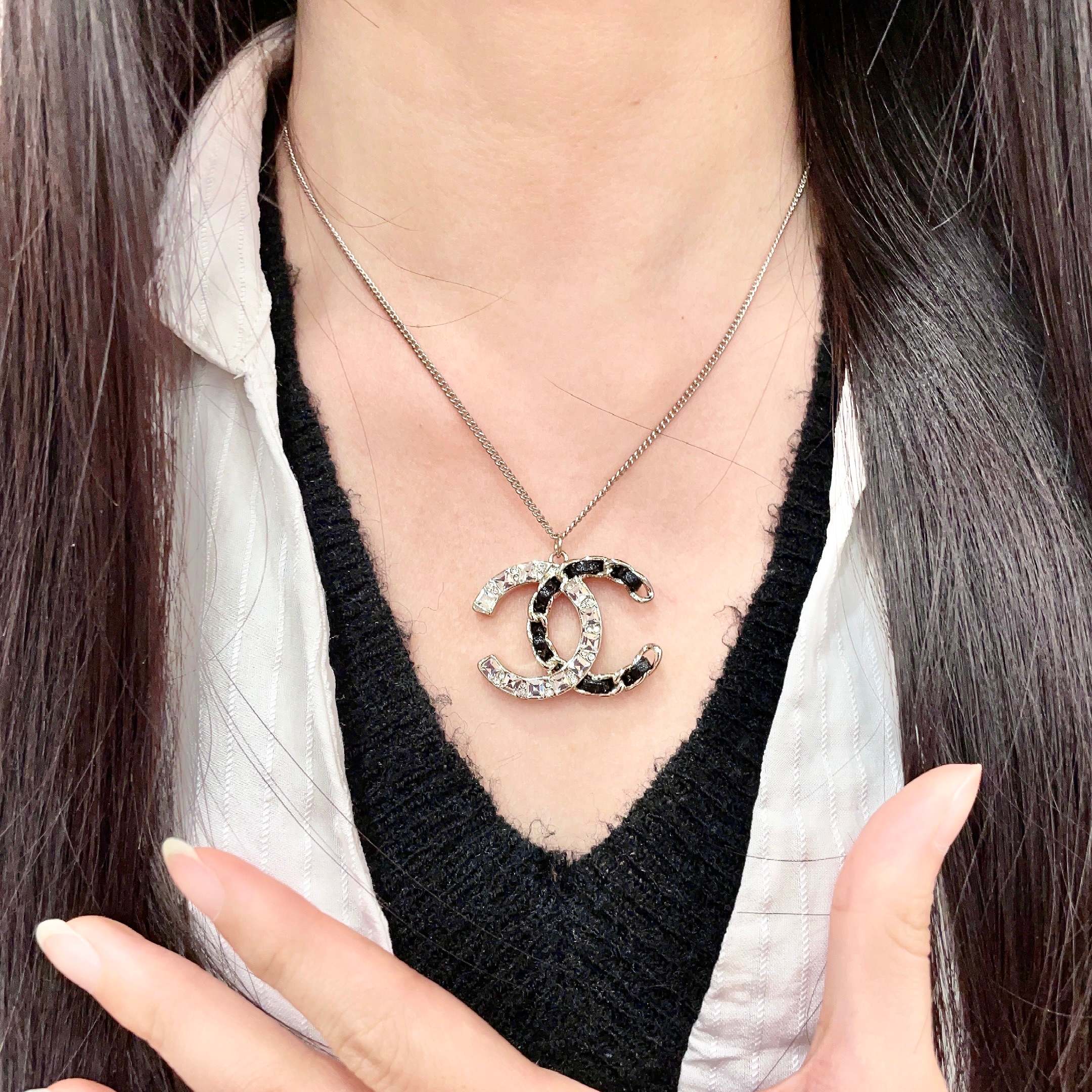 Chanel CC Logo Crystal Leather Woven Pendant Necklace necklace Gold-tone metal with clear faceted crystals and black woven leather accents 42cm