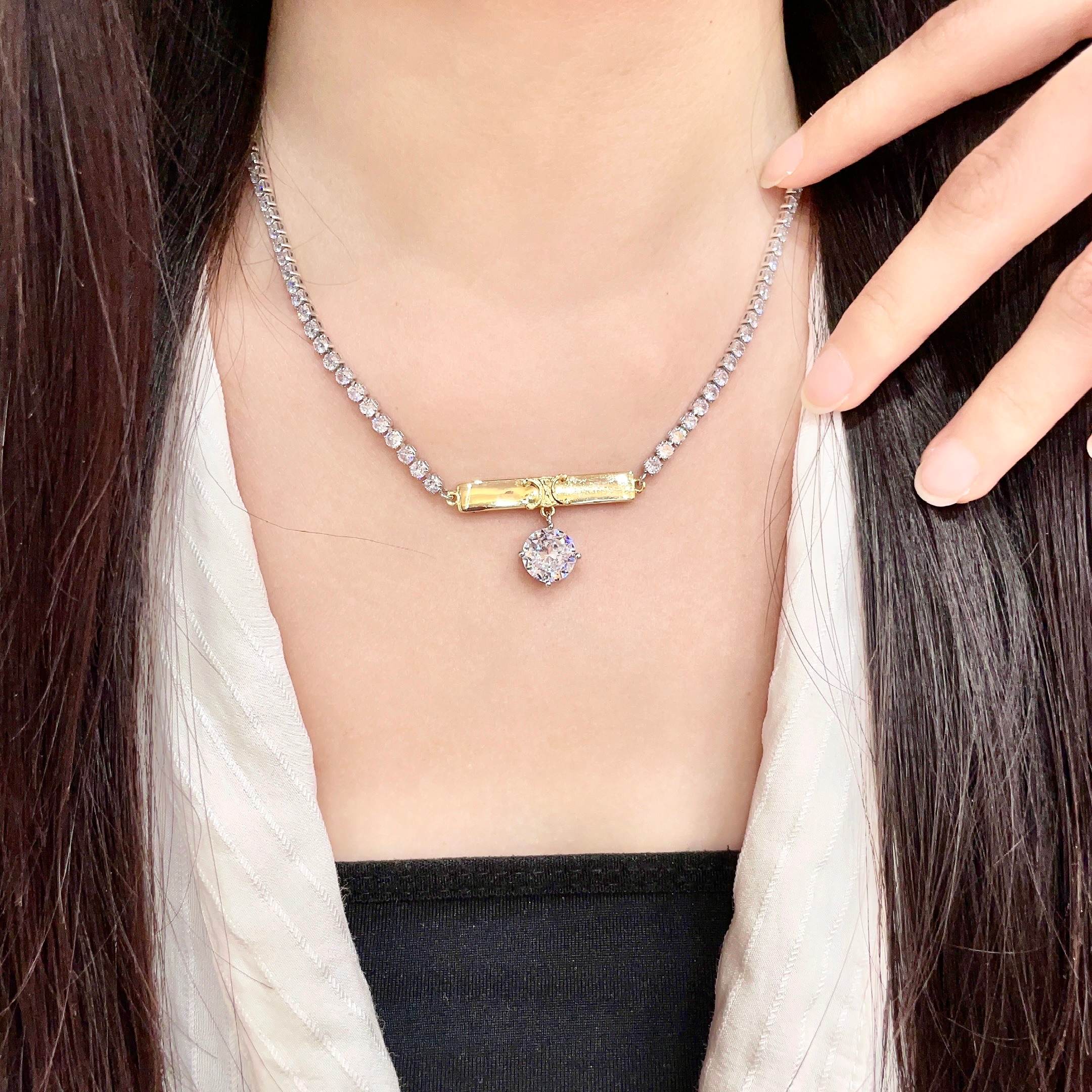 Celine Triomphe Bar Crystal Pendant Tennis Necklace necklace Two-tone silver-toned and gold-toned metal with clear faceted crystals 40cm