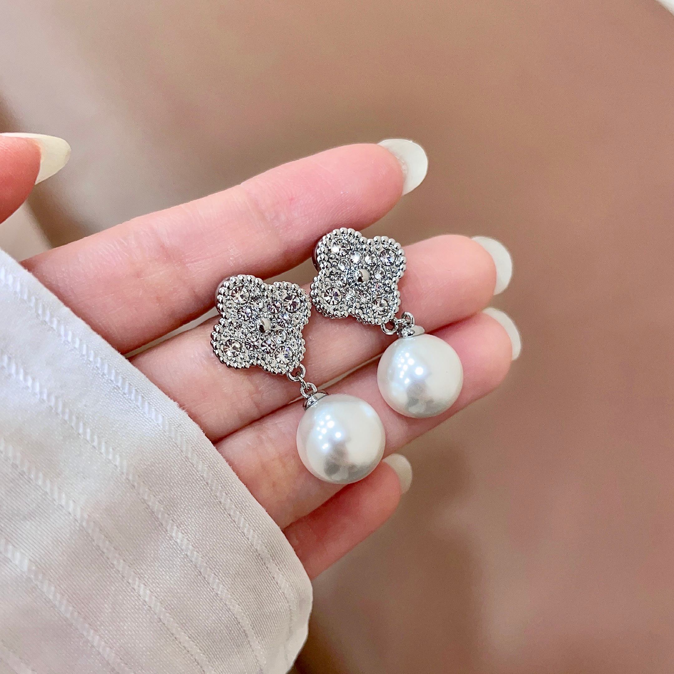 Van Cleef Arpels Magic Alhambra earrings white gold metal with clear diamond pave and white cultured pearl 2 5cm drop length