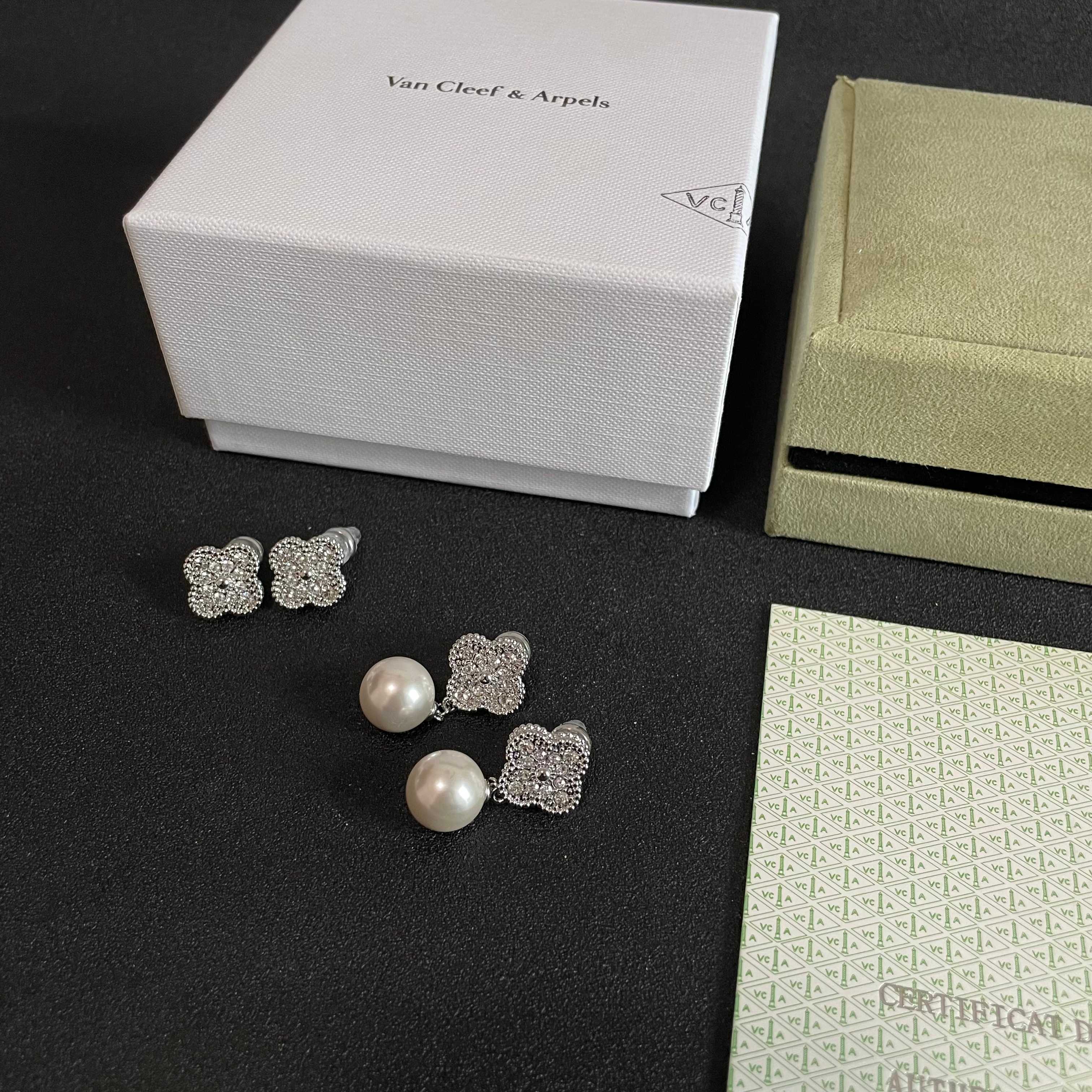 Van Cleef Arpels Magic Alhambra earrings white gold metal with clear diamond pave and white cultured pearl 2 5cm drop length