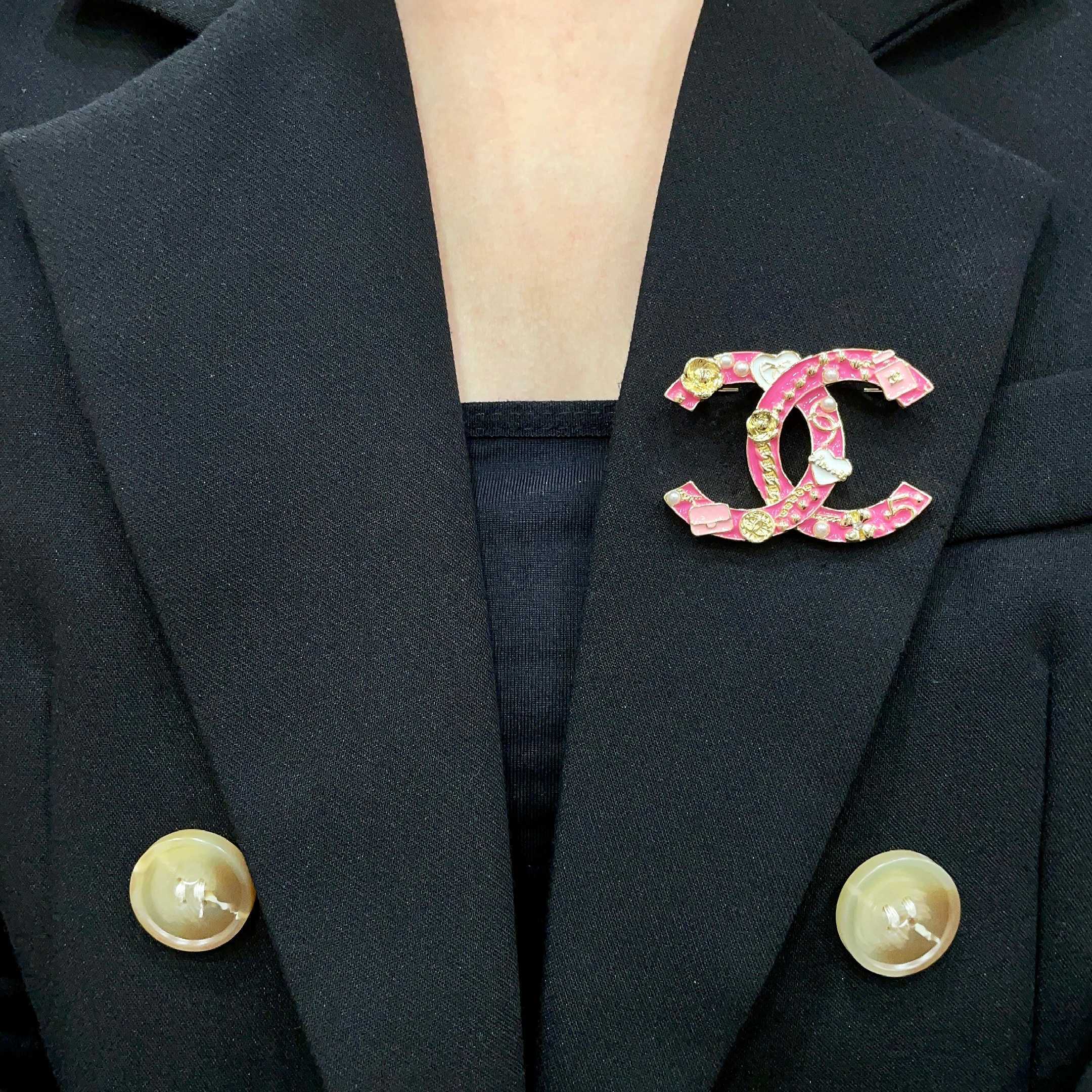Chanel CC Logo Charms Brooch brooch Gold-tone metal with hot pink enamel white enamel accents white faux pearls 4cm width