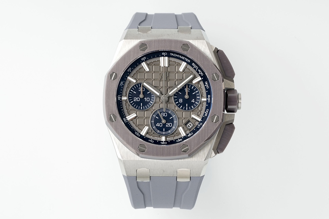 NO:586541,APS new product Audemars Piguet Royal Oak Offshore 26420 series 1 Features  AP Royal Oak Offshore 26420 is one of the brand's iconic sports watch series. It continues the classic octagonal bezel and 'Tapisserie' dial design, while strengthening the rugged and tough style. Its 42 mm case is made of stainless steel, ceramics, titanium or precious metals, with an anti-glare sapphire crystal glass, and is waterproof to meters. The strap is optional with rubber or metal bracelets, taking into account both sport and luxury. 2 Functions 1. Timing function Aps  Equipped with the latest 4401 self-winding movement, equipped with a central chronograph seconds hand, 30-minute and 12-hour chronograph sub-dials, and a date display window, and has a true flyback function, which is the highest level of domestic watchmaking technology. 2. Excellent performance vibration frequency of 28, times/hour, power reserve of about 70 hours, ensuring high accuracy through precise adjustment. 3. Practical design screw-in crown and chronograph buttons enhance water resistance, and luminous-coated hands and hour markers improve low-light readability. 3. Craftsmanship  1. The all-in-one machine equipped with the complex movement APS. The movement is finely polished by hand and decorated with traditional high-end watchmaking decorations such as Côtes de Genève and chamfering polishing. 2. The case is processed from the original APS mold. The case and bracelet are alternately brushed and polished to highlight the sense of layering; the symmetrical assembly of the octagonal bezel screws reflects strict quality control. 3. Detailed carving 'Méga'  Tapisserie' three-dimensional plaid dial is carved by CNC machine tools, and then electroplated and sandblasted, with rich color options (such as blue, black, gray, etc.). 4 Summary APS's new Audemars Piguet 26420 series combines the brand's iconic design, complex functions and top-level craftsmanship. It is suitable for daily wear and can also meet professional timing needs. It can be called a model of modern sports watches. Watch friends are welcome to try it, audemars19860909APS新品爱彼皇家橡树离岸型26420系列 1特点 AP皇家橡树离岸型26420是品牌标志性的运动腕表系列之一,延续了经典的八角形表圈与“Tapisserie”格纹表盘设计,同时强化了粗犷硬朗的风格.其42毫米表壳采用精钢、陶瓷,钛金属或贵金属材质,搭配防眩蓝宝石水晶玻璃表镜,防水深度达米.表带可选橡胶或金属链带,兼顾运动与奢华感.  2功能 1. 计时功能Aps 搭载最新4401自动上链机芯,配备中央计时秒针、30分钟和12小时计时副盘,以及日期显示窗口,并具备真飞返功能,是国内制表技术的最高境界 2. 卓越性能振频28,次/小时,动力储存约70小时,通过精准调校确保高精度.  3. 实用设计旋入式表冠和计时按钮增强防水性,夜光涂层指针和时标提升暗光可读性.  3工艺 1. 复杂机芯APS搭载的一体机,机芯经手工精细打磨,饰有日内瓦波纹、倒角抛光等传统高级制表装饰.  2. 表壳处理APS原版开模,表壳与表链采用拉丝与抛光交替工艺,凸显层次感；八角形表圈螺丝的对称装配体现严格品控.  3. 细节雕琢“Méga Tapisserie”立体格纹表盘通过数控机床雕刻,再经电镀和喷砂处理,色彩选择丰富（如蓝、黑、灰等）.  4总结 APS新品爱彼26420系列融合了品牌标志性设计、复杂功能与顶级工艺,既适合日常佩戴,亦能满足专业计时需求,堪称现代运动腕表的典范之作.欢迎表友把玩,,audemars,Watch