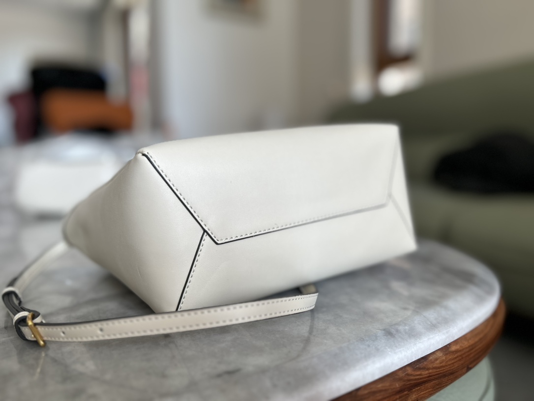 Designed with a clean, structured silhouette, this piece pairs refined a - Lifestyle 4