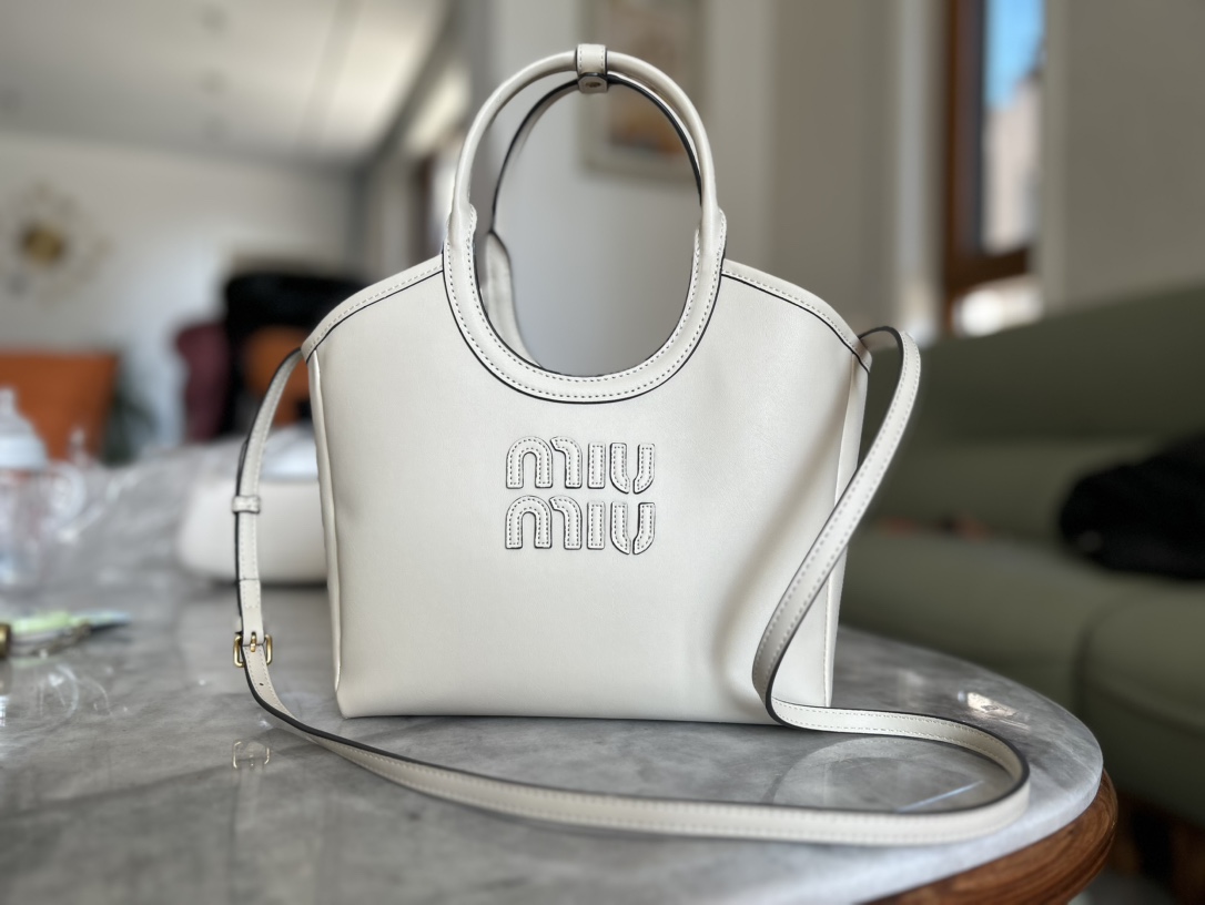Designed with a clean, structured silhouette, this piece pairs refined a - Lifestyle