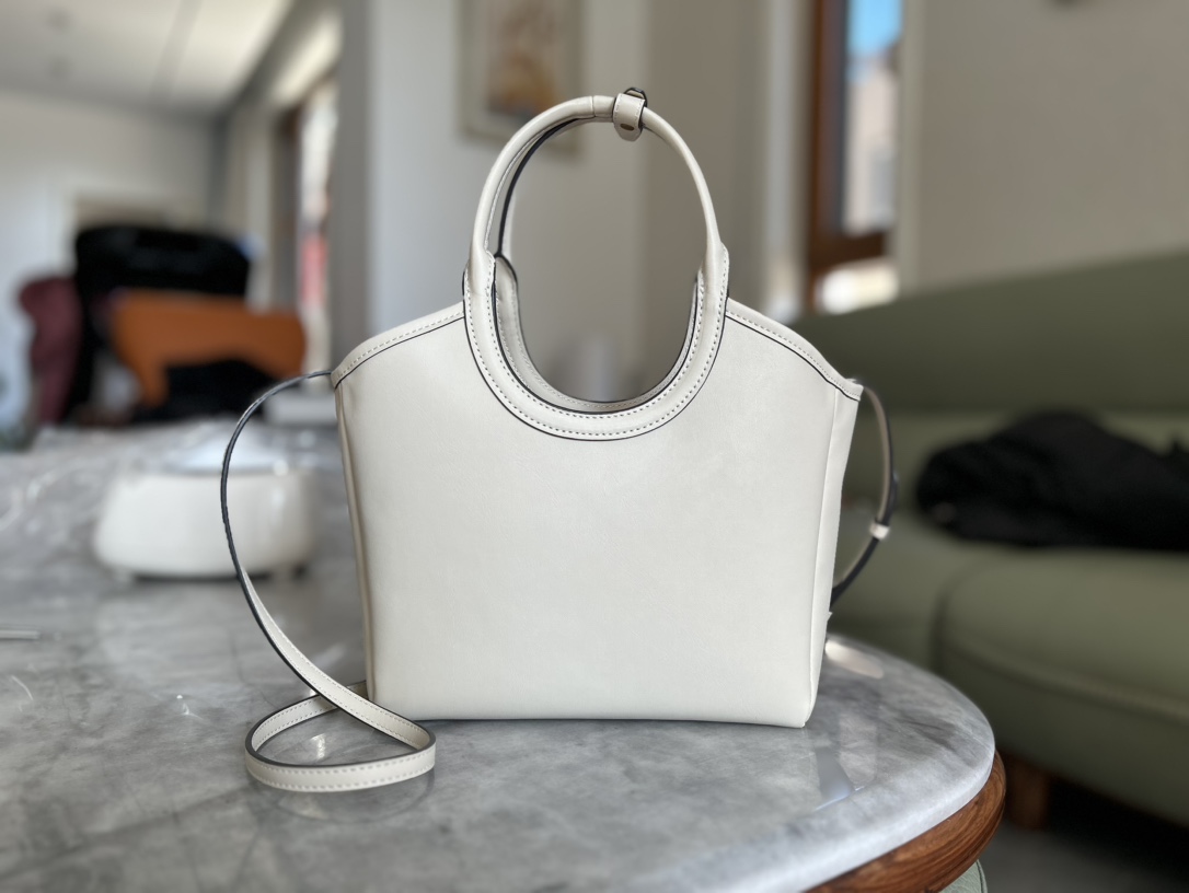 Designed with a clean, structured silhouette, this piece pairs refined a - Lifestyle 3