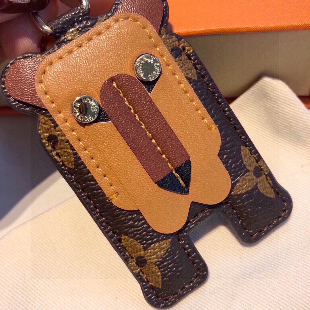 LV Lion Bag Charm and Key Holder - Comprehensive 7