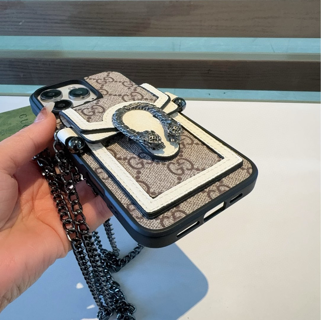 。。蛇🐍年爆款 Gucci古驰贴皮酒神系列蛇头卡包手机壳 斜挎手机壳
型号:为了不出现报错型号,请打开