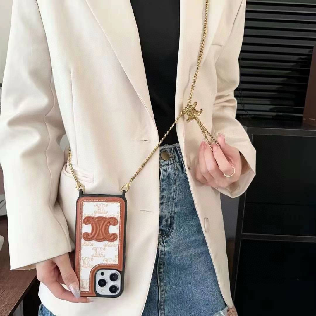 💥celine赛琳凯旋门手机壳 凯旋门链条挂绳可斜挎可挂脖
型号:为了不出现报错型号,请打开本机查看手