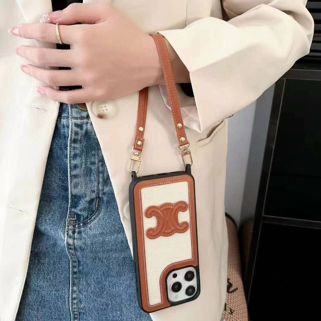 💥celine赛琳凯旋门手机壳 凯旋门手腕带手提壳
型号:为了不出现报错型号,请打开本机查看手机设置显