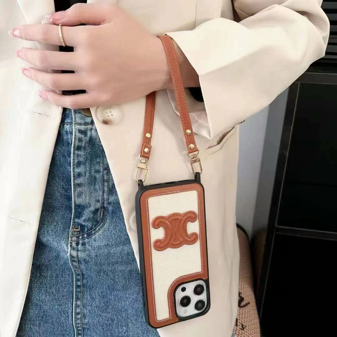  💥celine赛琳凯旋门手机壳 凯旋门手腕带手提壳
型号：为了不出现报错型号，请打开本机查看手机设置显