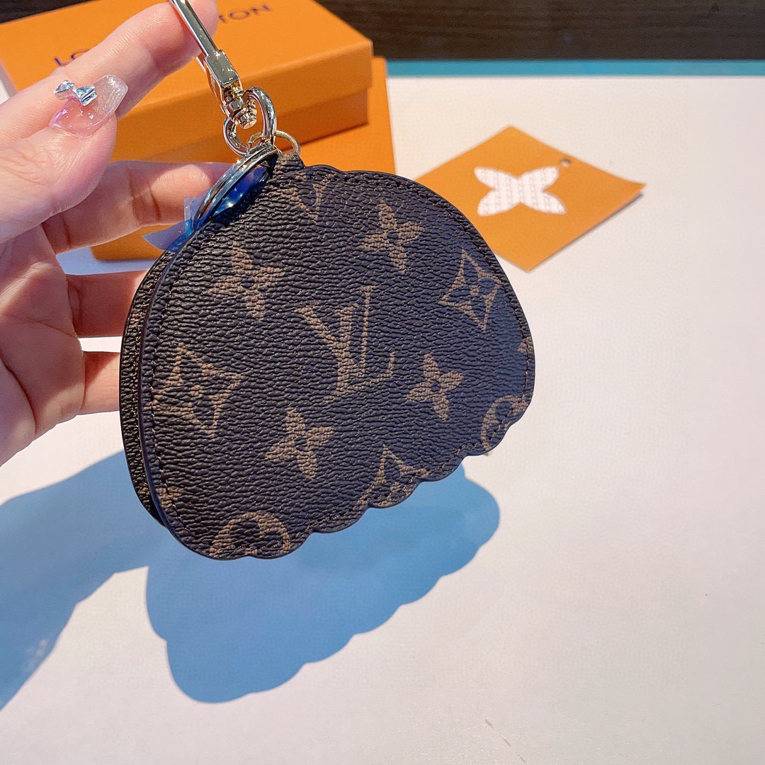 LV草间弥生南瓜零钱包挂饰，南瓜零钱包9×11×2.5㎝，不是小费包，放iPod刚刚好！可以当耳机包！挂