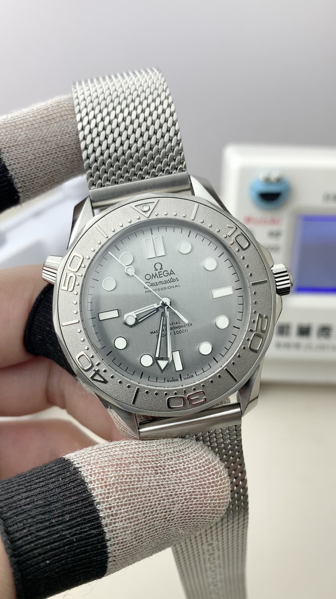 Omega Seamaster Professional Silver Dial Titanium Bezel Steel Mesh Bracelet