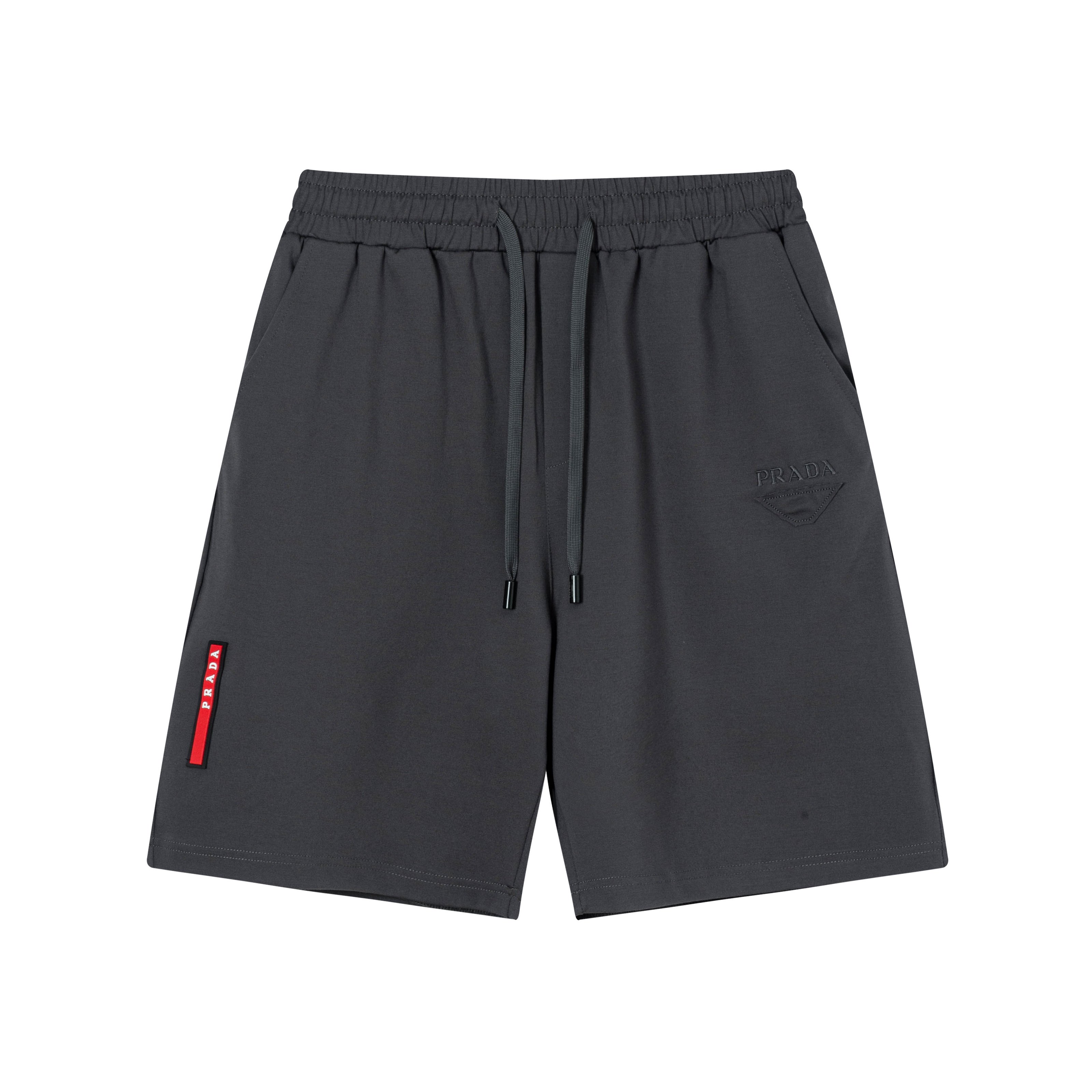 2025 PRADA Nuevos pantalones cortos de punto, telas personalizadas, logotipo clásico de cremallera triangular. La versi…