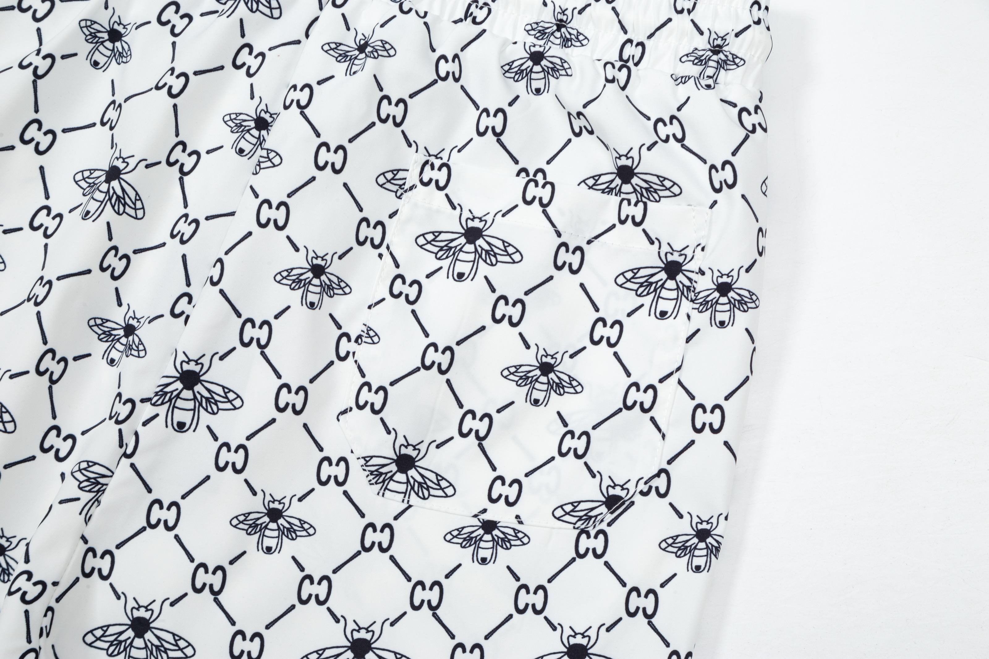 GUCCI 经典款小蜜蜂 沙滩短裤服装,gucci 7