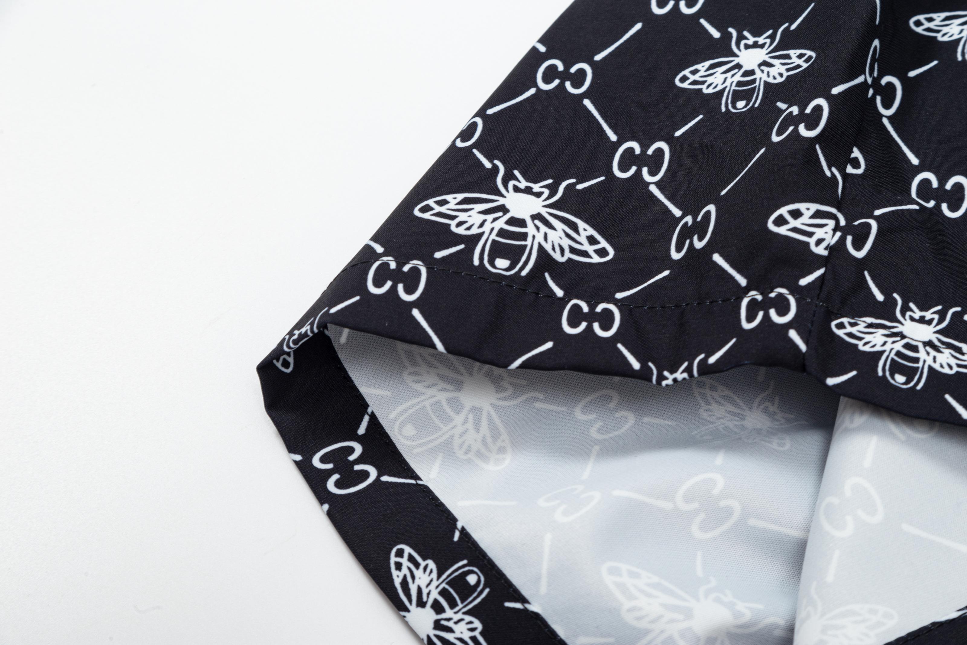 GUCCI 经典款小蜜蜂 沙滩短裤服装,gucci 7