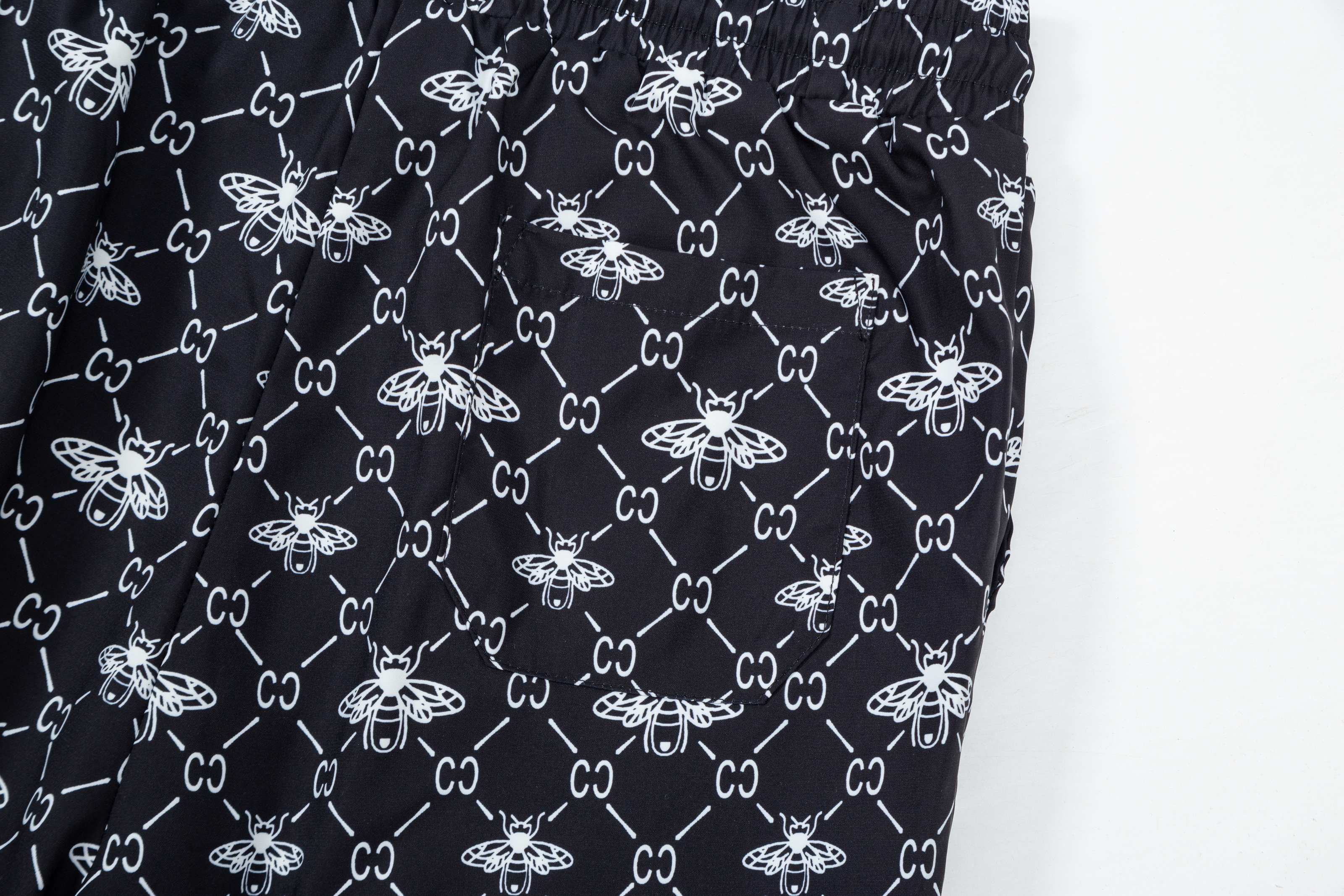 GUCCI 经典款小蜜蜂 沙滩短裤服装,gucci 8