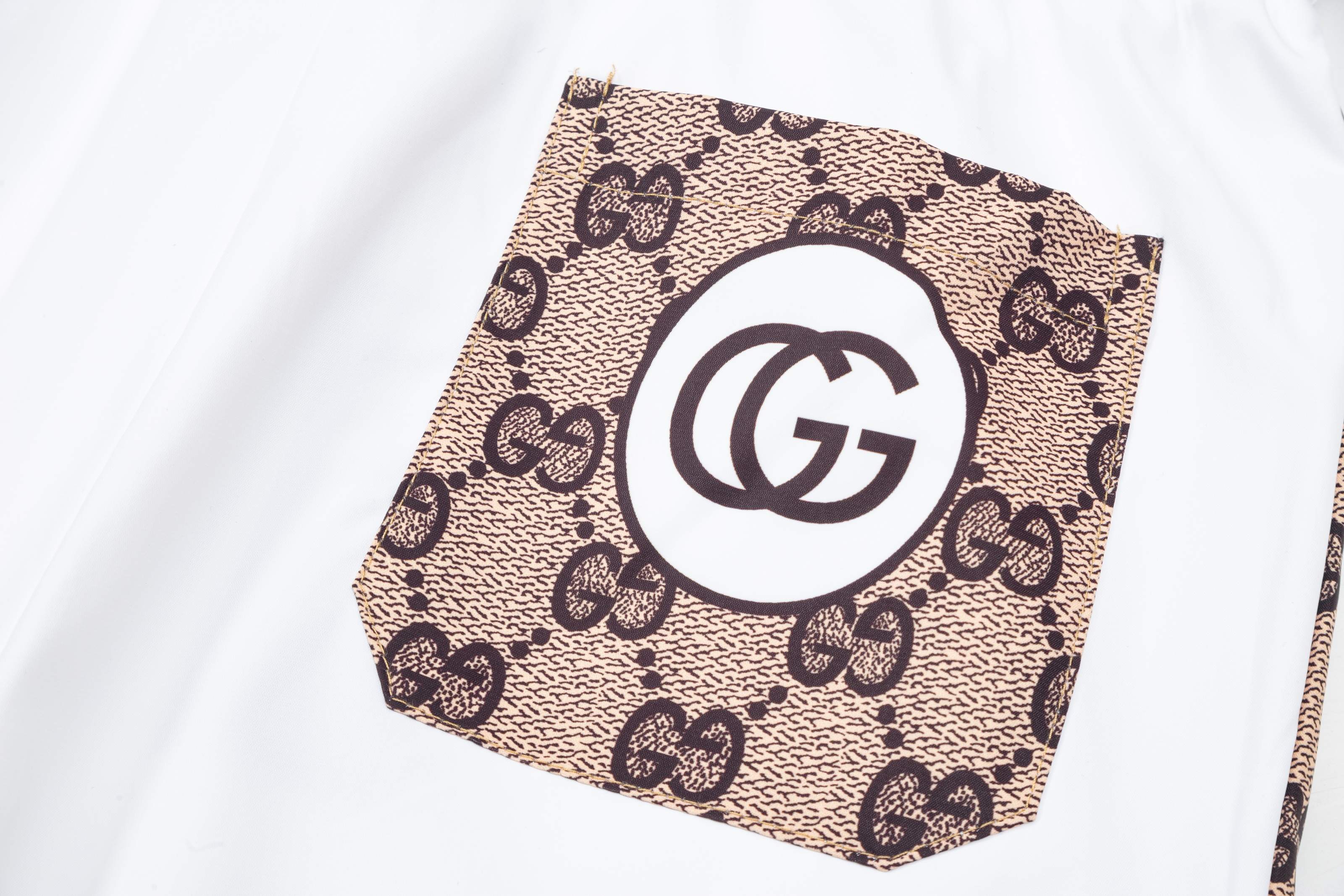 GUCCI  沙滩短裤服装,gucci 7