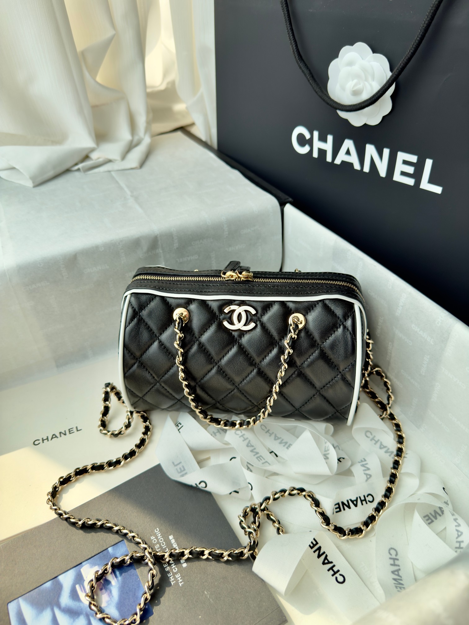 Elegant Chanel Quilted Leather Barrel Bag with Chain Strap 2 a1741512612452 6221