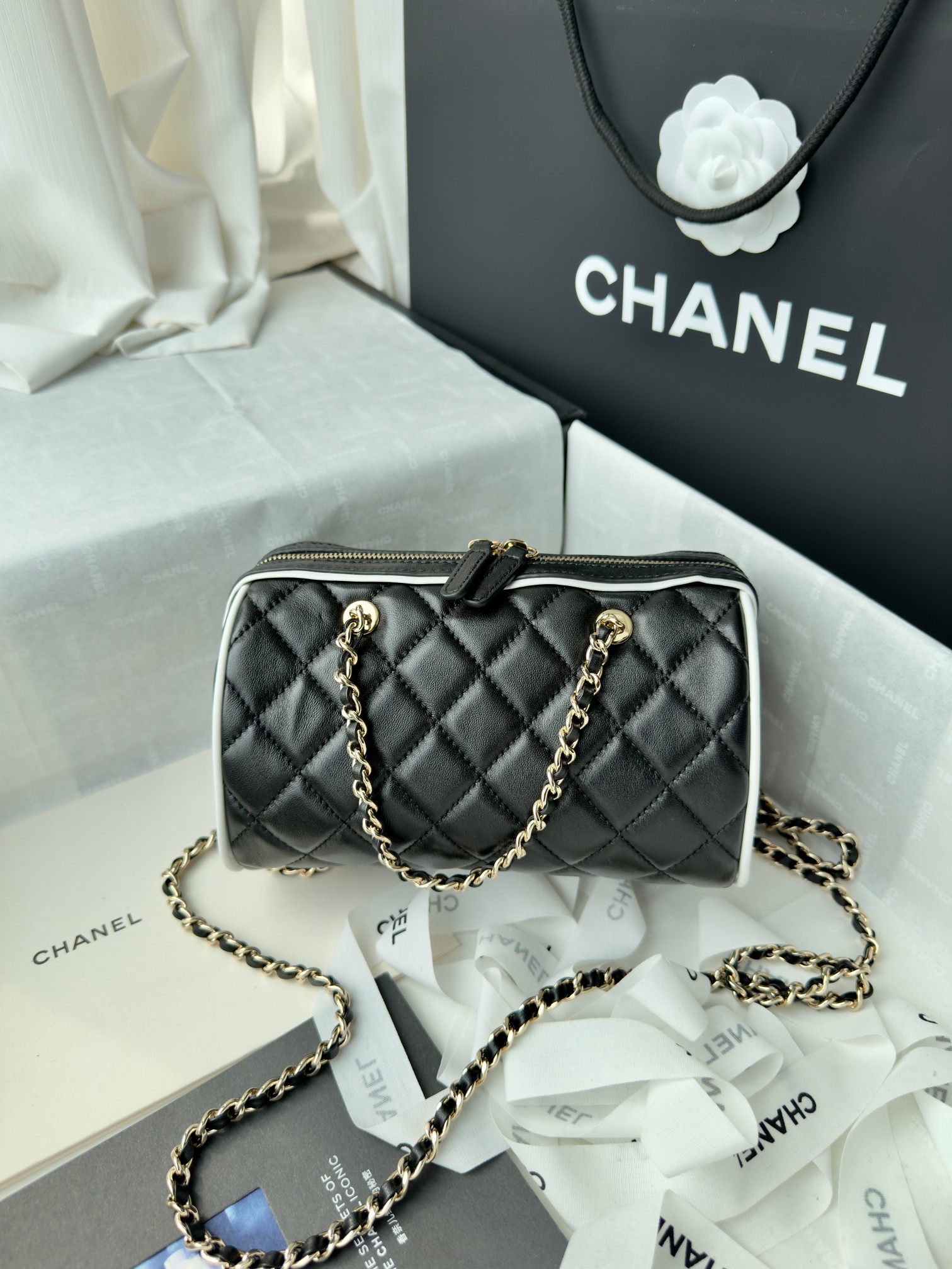Elegant Chanel Quilted Leather Barrel Bag with Chain Strap 3 a1741512612546 8725
